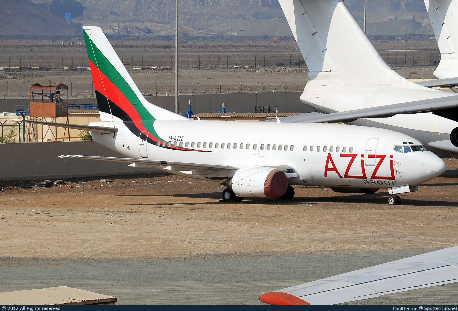 Photo of M-AZIZ - Boeing 737-505 operated by Azizi Group