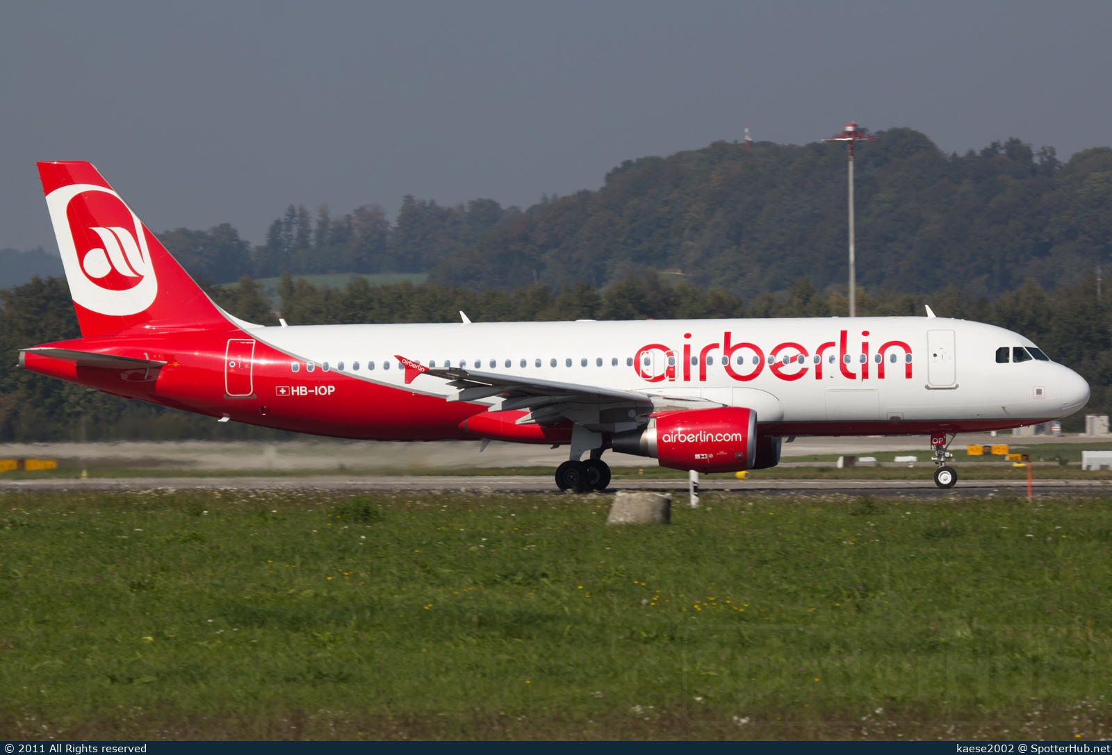 Photo of HB-IOP - Airbus A320-214 operated by Air Berlin (opb Belair Airlines)