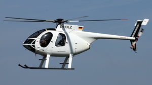 Photo of D-HOLZ - Hughes 369E operated by DHD Heliservice