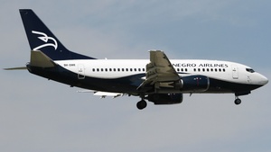Photo of 9H-OME - Boeing 737-505 operated by Montenegro Airlines (opb AirX Charter)