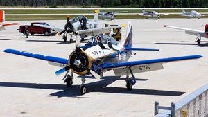 Photo of NX289RD - North American T-28C Trojan operated by Private