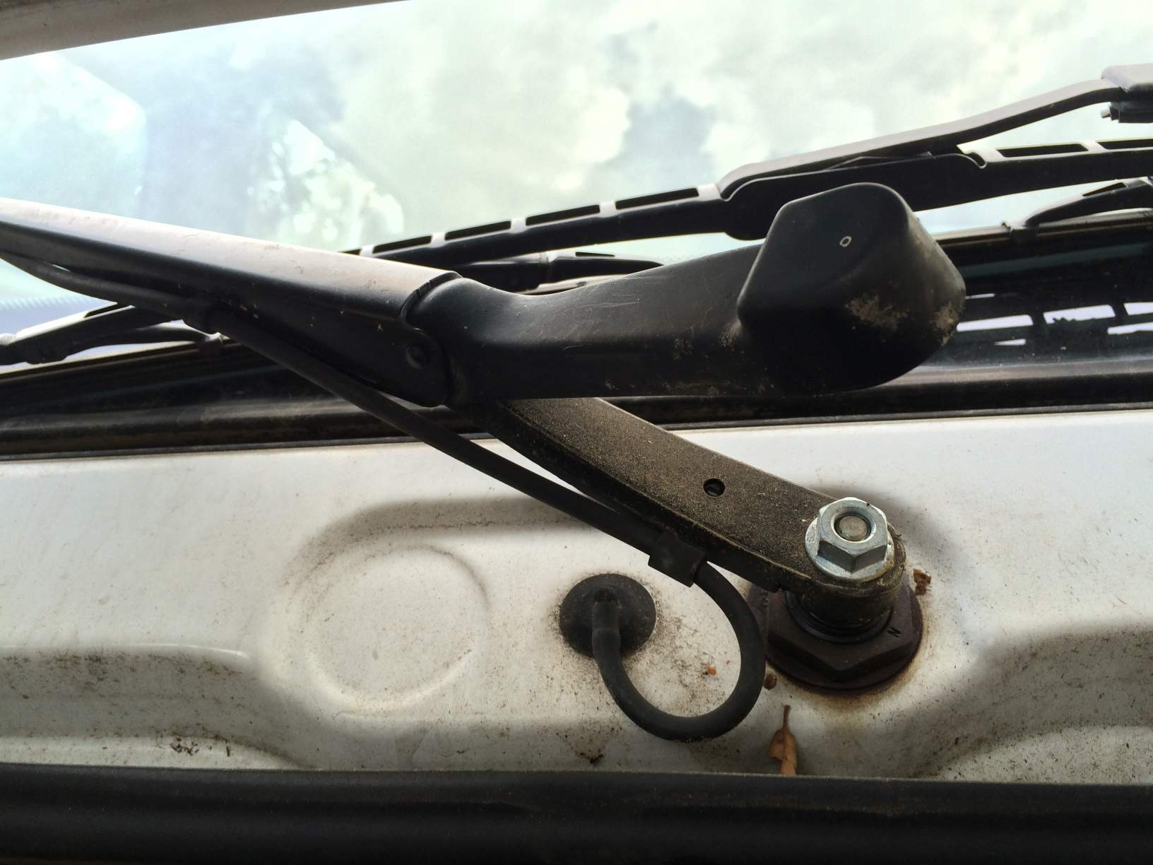 The bolt holding the wiper arm in place