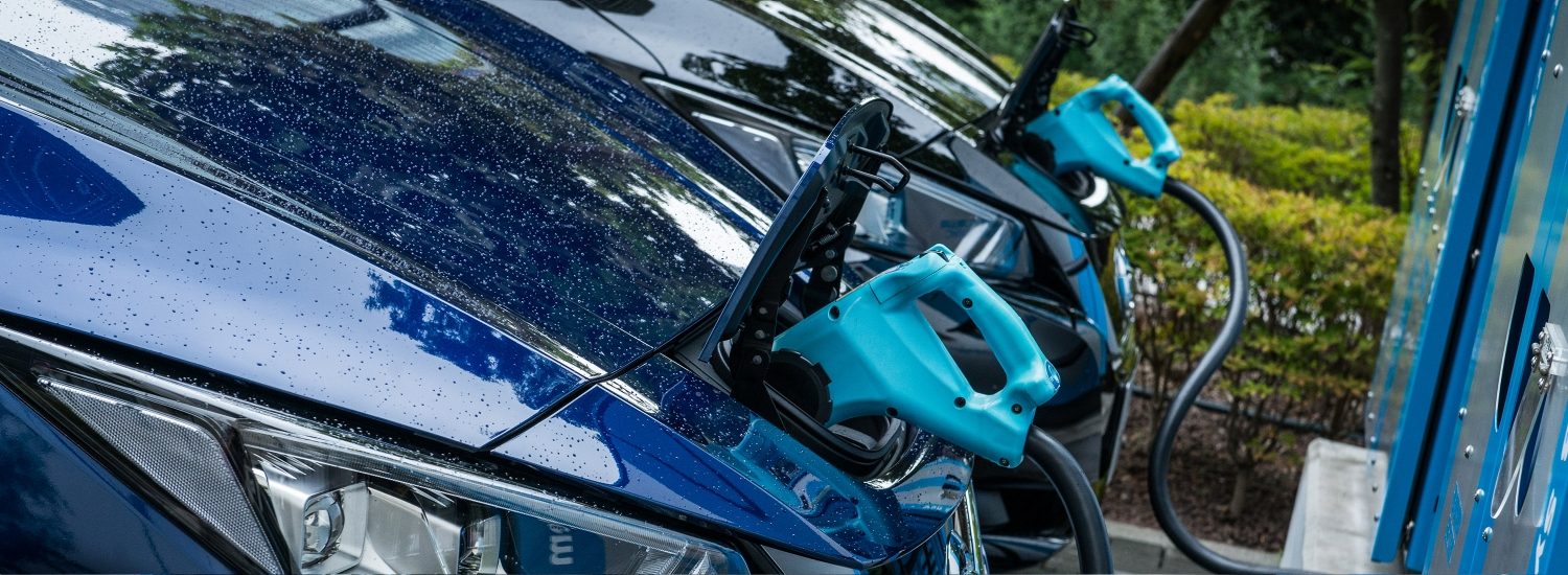 Nissan LEAFS charging at public station