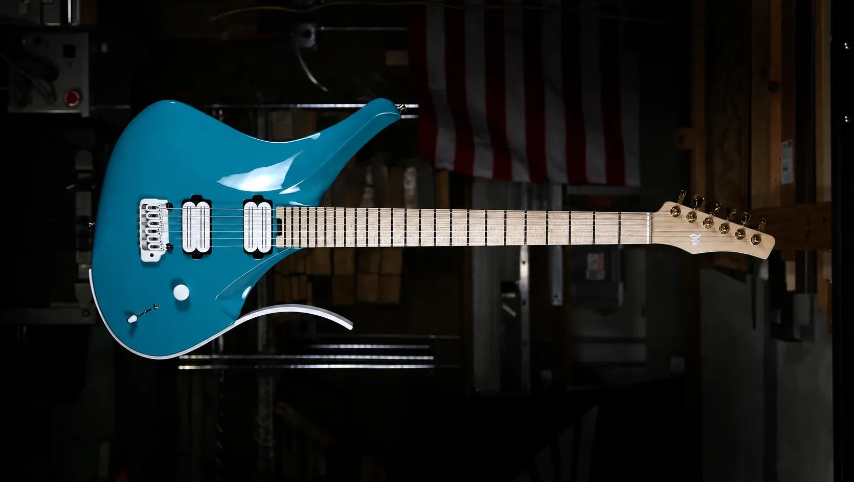 Blue Virtus guitar with maple fretboard in the workshop