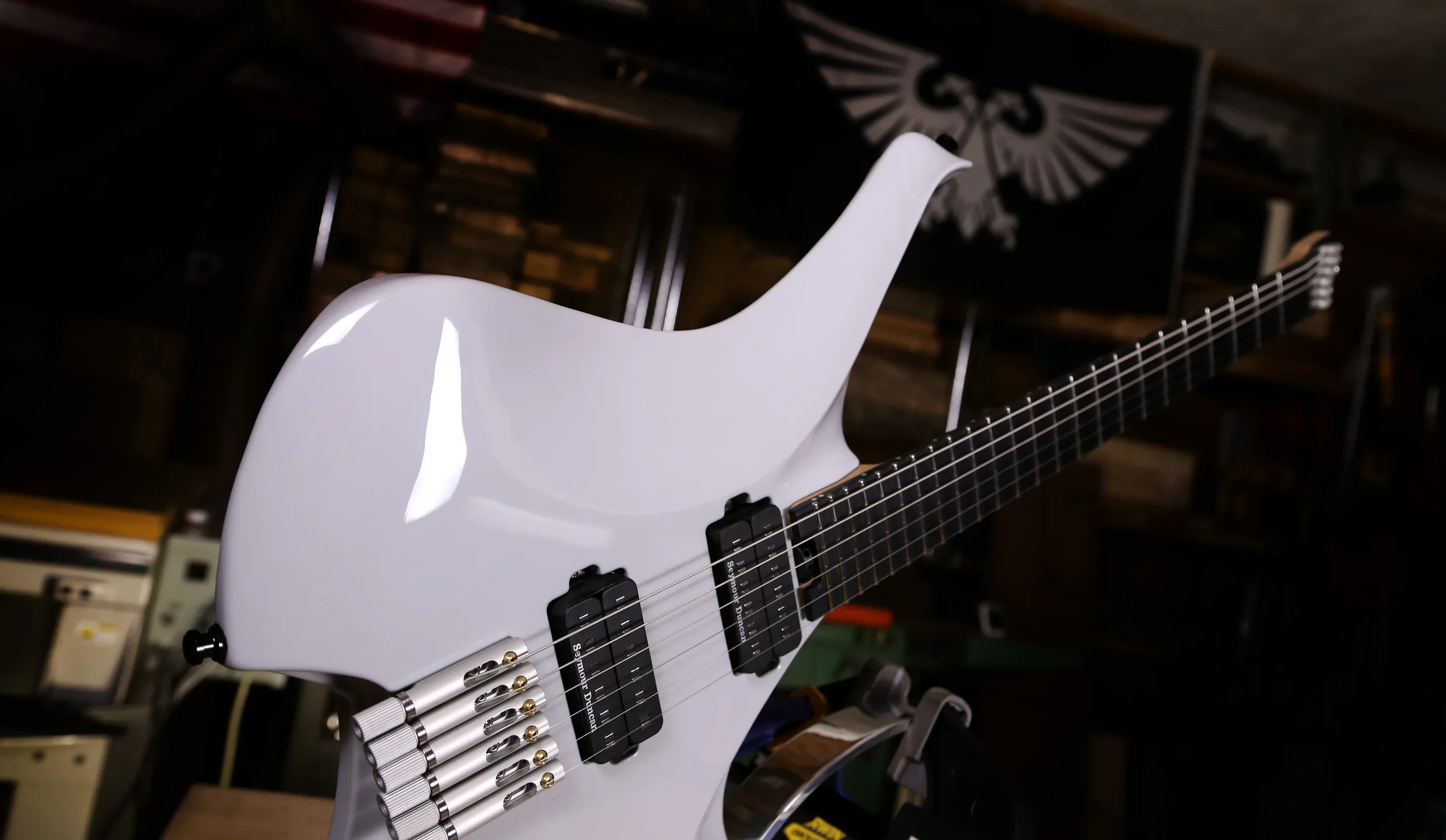 A Dean Gordon custom guitar presented at an industry event