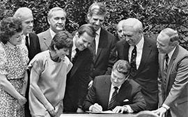 President Ronald Reagan signs legislation to change the national drinking age from 18 to 21