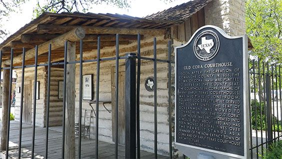 Old Cora Courthouse. Built in 1856, the Old Cora Courthouse is a split-log, one room courthouse that also served as a post office when it was built. It is the oldest courthouse in Texas still standing, though it now only stands as a historic landmark.