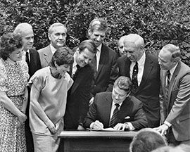 President Ronald Reagan signs legislation to change the national drinking age from 18 to 21.