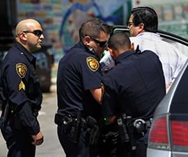 San Antonio Police Department (SAPD) arresting a suspect for soliciting prostitution. Courtesy of mysanantonio.com