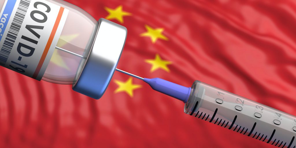 China Coronavirus vaccine. Covid-19 vaccination, chinese flag background.