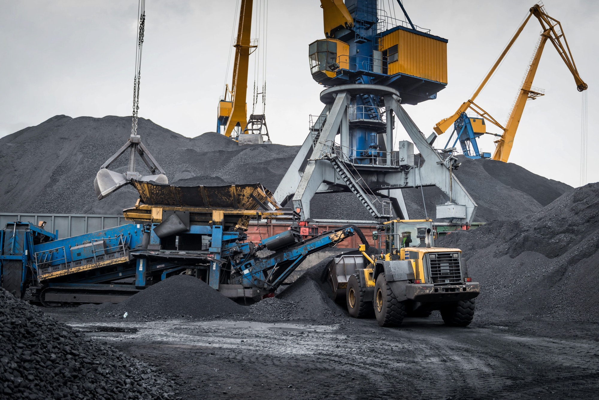 Work in port coal handling terminal.