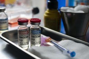 Covid-19 coronavirus vaccine for vaccination plan in twice, conceptual image