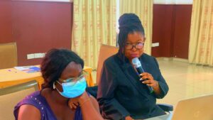 Image of Madam Esther Akua Gyamfi, Executive Secretary of the National Council on Persons with Disabilities,delivering a presentation.