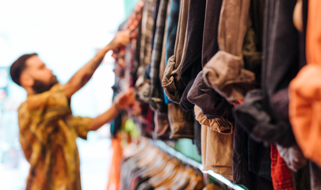 Defocussed man in a clothing store