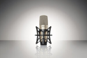 The Shure KSM32 Microphone with a grey background