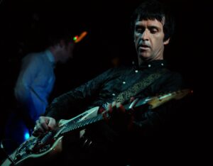 Johnny Marr Playing his Jaguar on stage