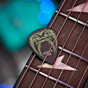 Pick on fretboard