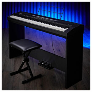 Black SDP-4 Stage Piano by Gear4music in a dark studio with blue lights, equipped with a stand and stool 