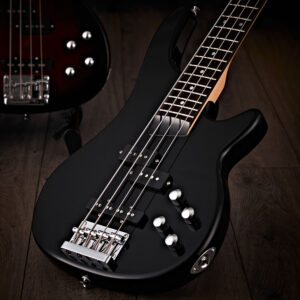 The 3/4 Chicago Bass Guitar by Gear4music, Black positioned at a slant, showing off controls and gloss finish