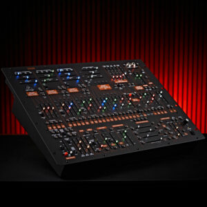 The Behringer 2600 Analog Synthesizer in a spooky setting with red lights behind