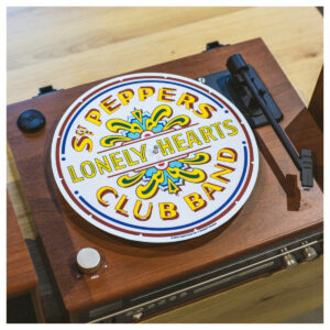 The Crosley Slipmat for vinyl, with The Beatles SGT Pepper print