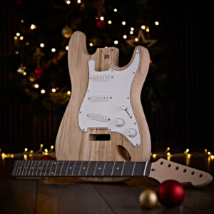 The Guitarworks Duo-Cutaway DIY Electric Guitar Kit in front of the Christmas tree