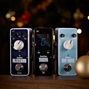 The SubZero Micro Pedals 3 Pack - Essentials Pack surrounded by Christmas baubles and lights