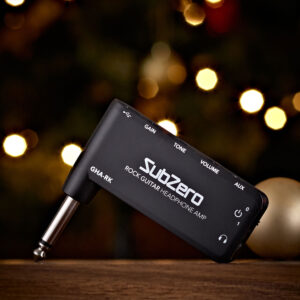 The SubZero Rock Guitar Pocket Headphone Amplifier in a Christmas setting, with fairy lights behind