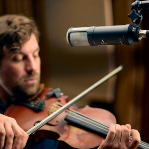 A male violinist using the Universal Audio Sphere LX modelling microphone