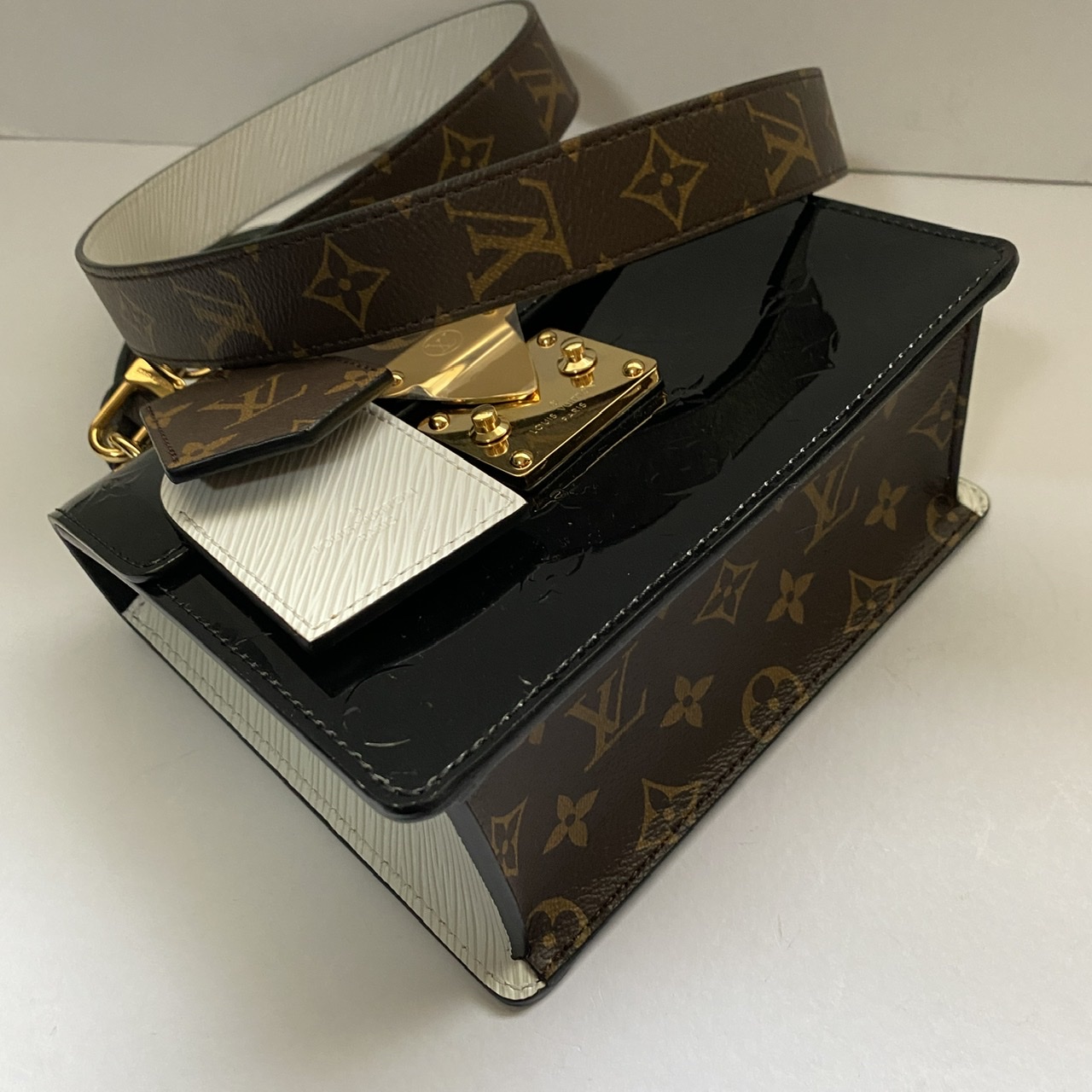 LOUIS VUITTON VERNIS MALUBI BLACK – Christel Aldenhoven