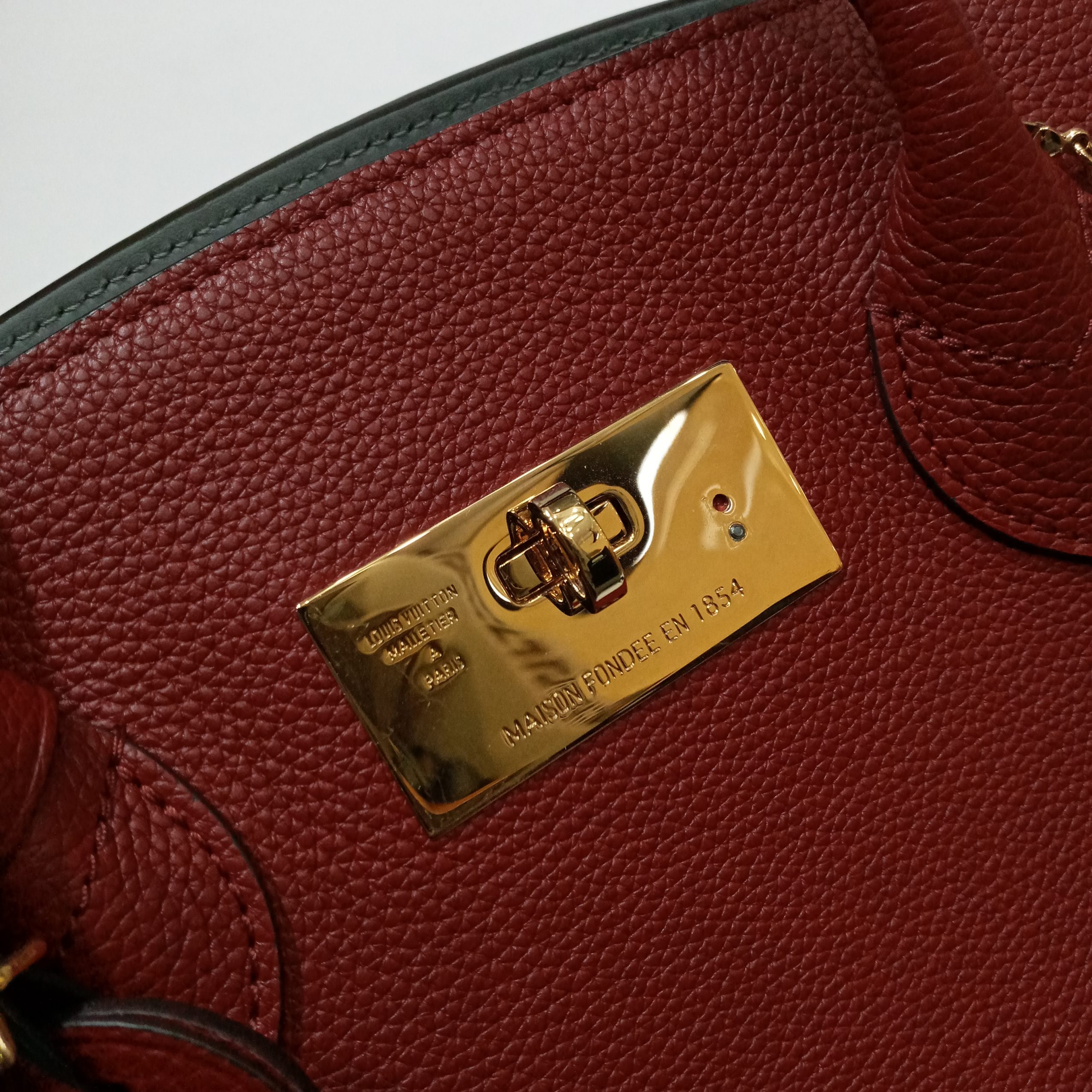 Louis Vuitton Milla PM, Red with Gold Hardware, Preowned in