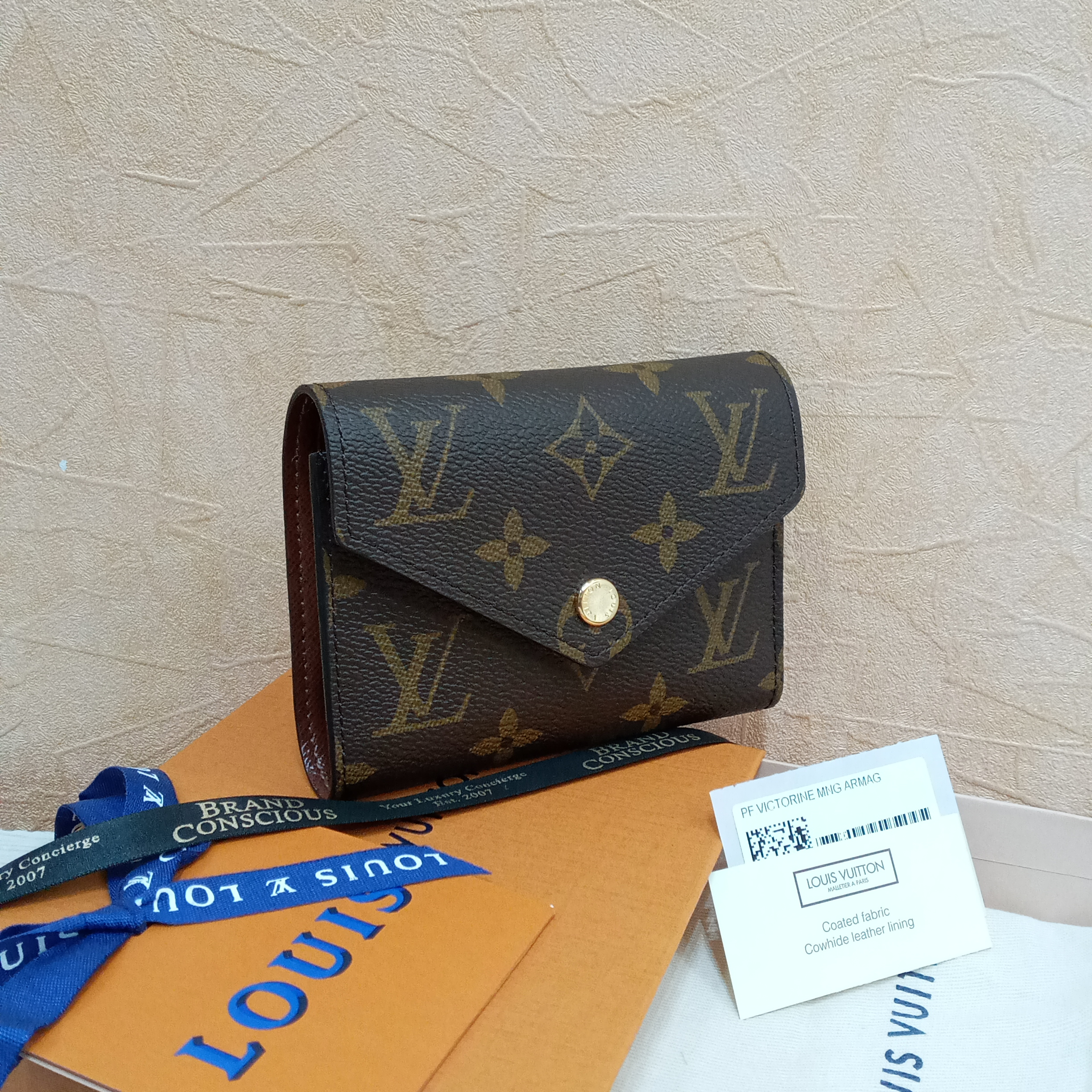 Louis Vuitton Victorine Wallet Monogram Brown Lining in Coated