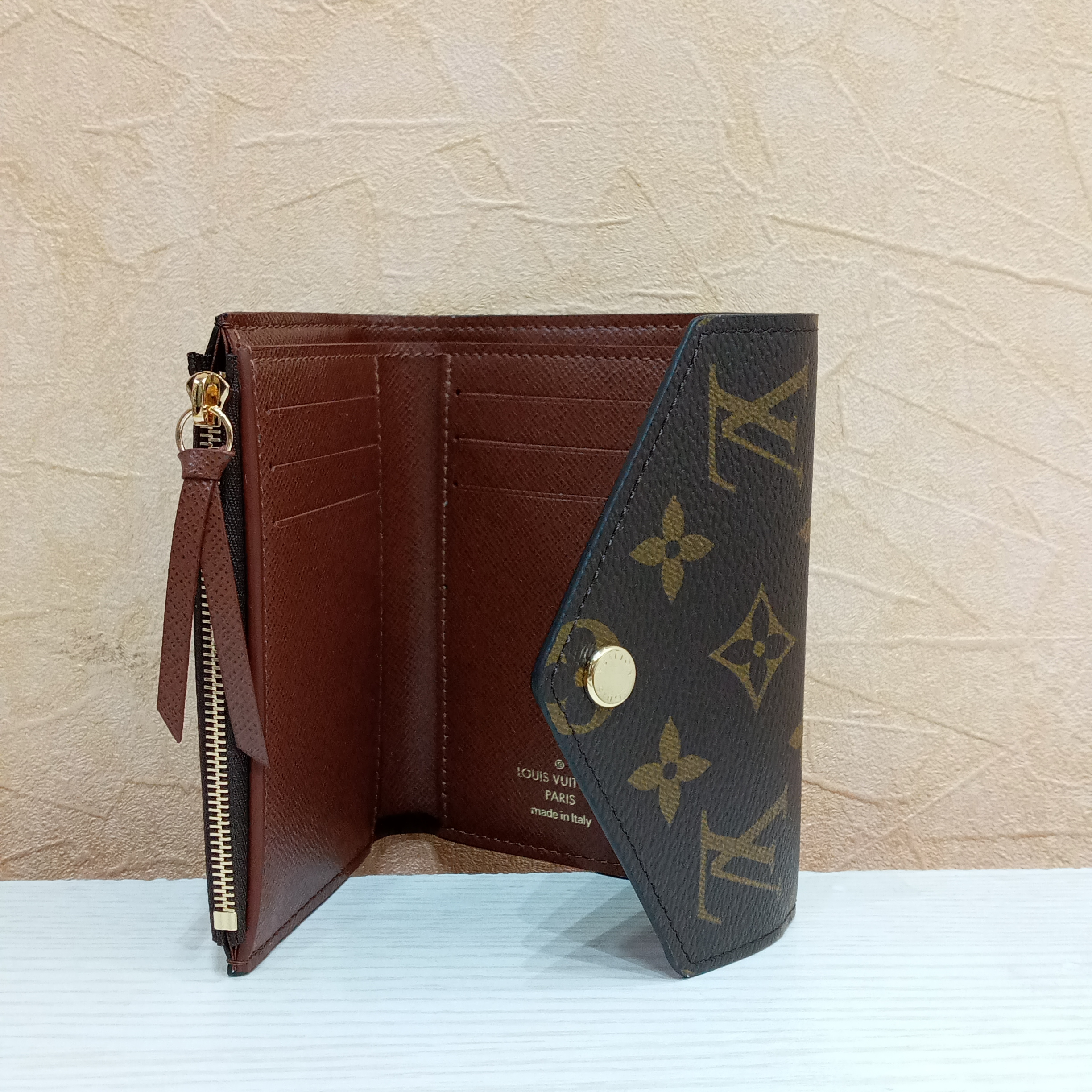 Louis Vuitton Victorine Wallet Monogram Brown Lining in Coated