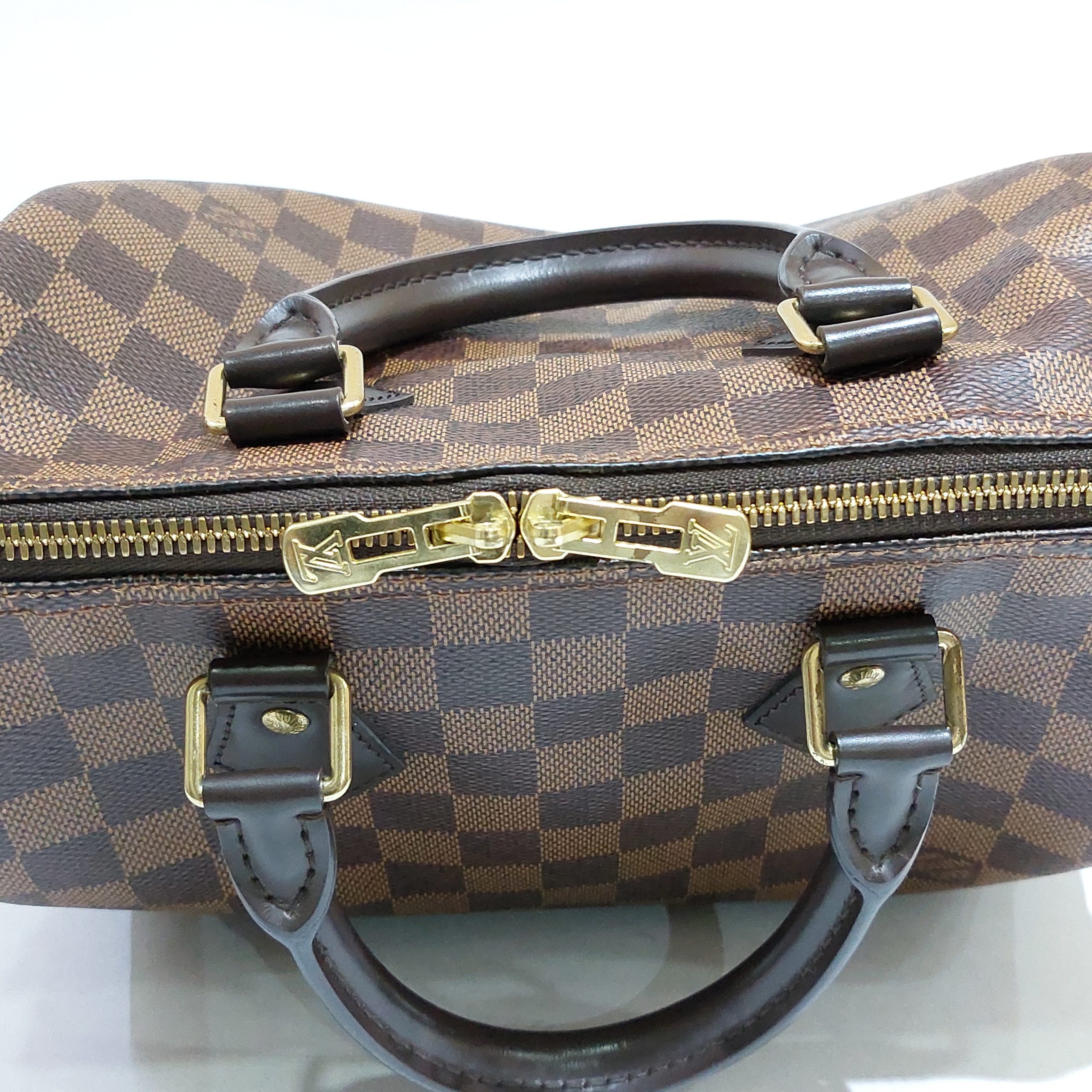 JZC7755 Damier Ebene Speedy 25 Bandouliere, Luxury, Bags & Wallets on  Carousell