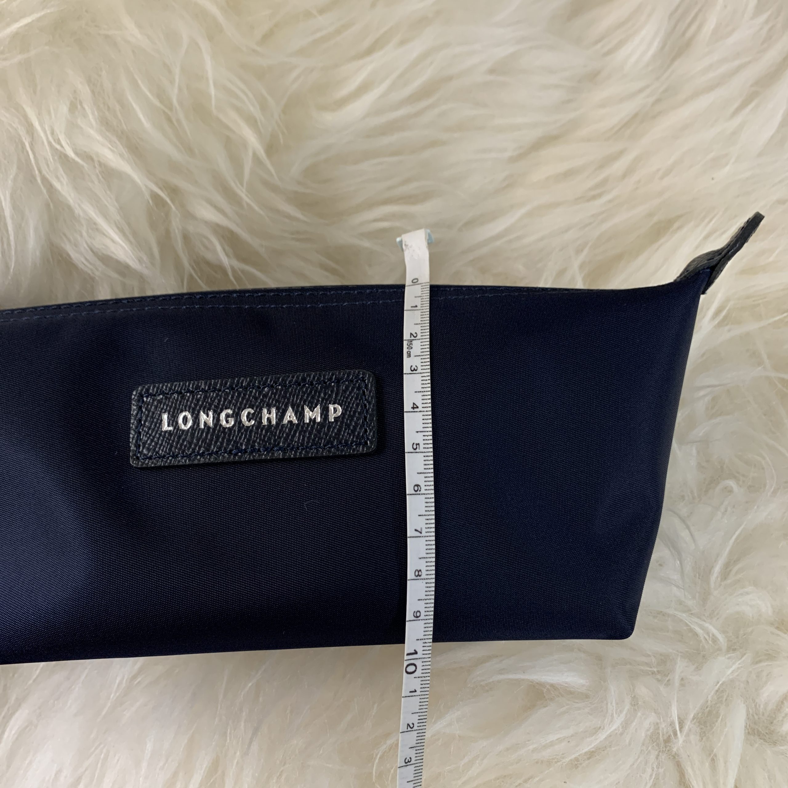 Longchamp Le Pliage Neo Navy Blue Nylon Clutch Bag at FORZIERI