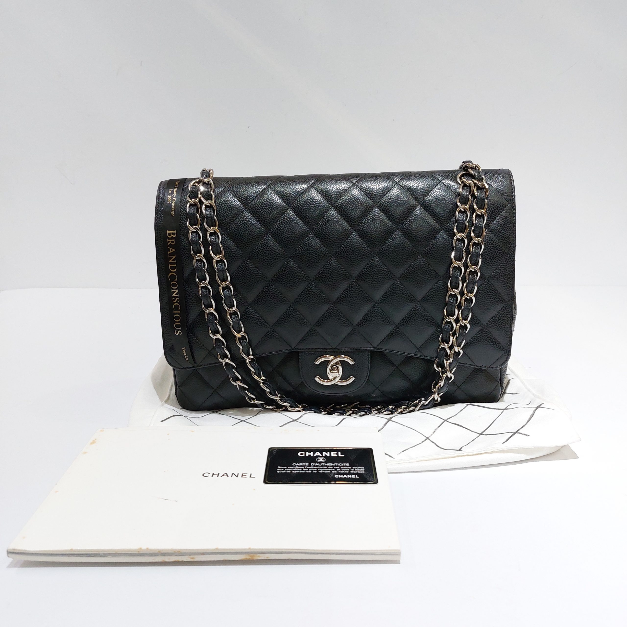 Chanel Maxi Double Flap Bag Black Caviar - BrandConscious Authentics