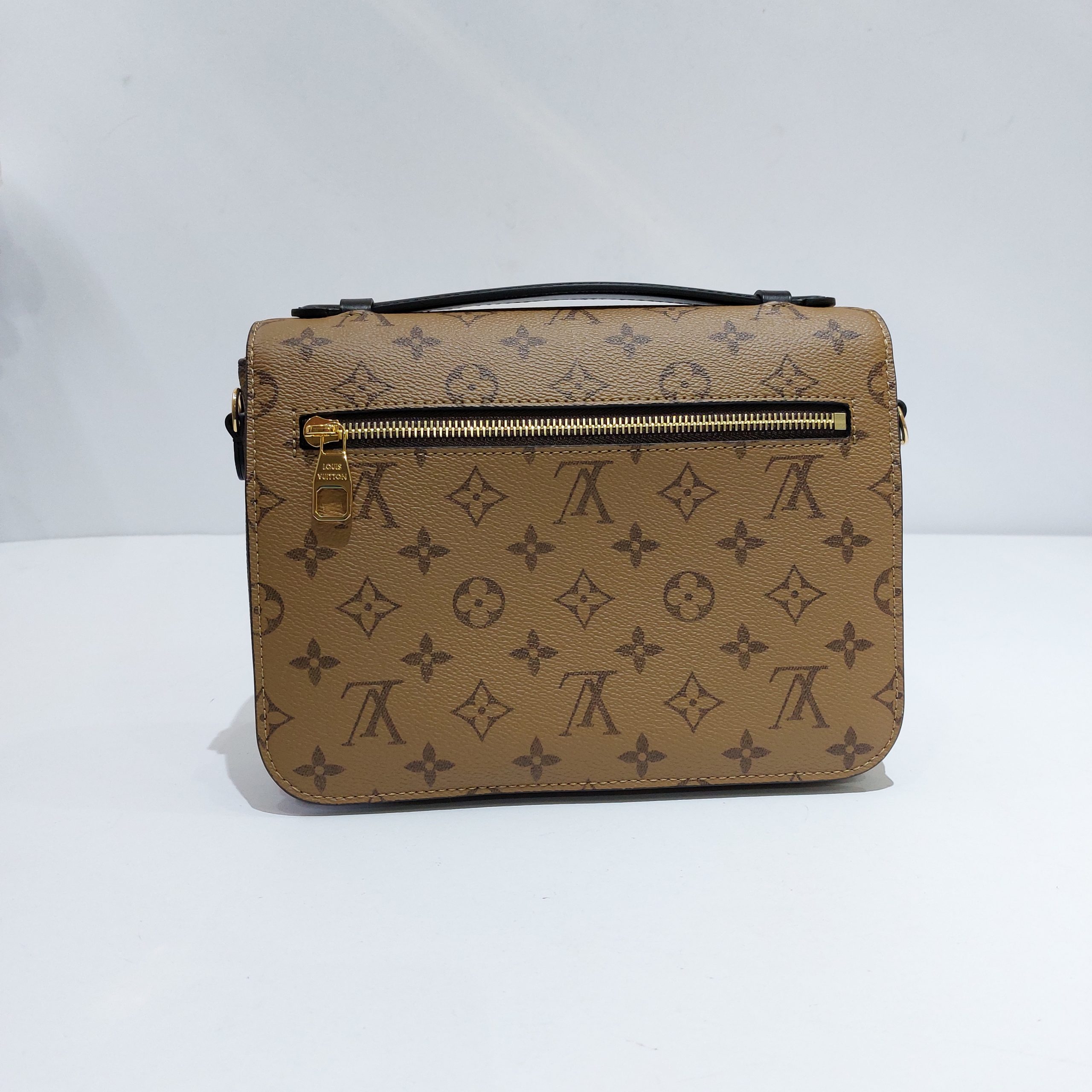 Louis Vuitton Pochette Métis Monogram Reverse Canvas BNEW - BrandConscious  Authentics