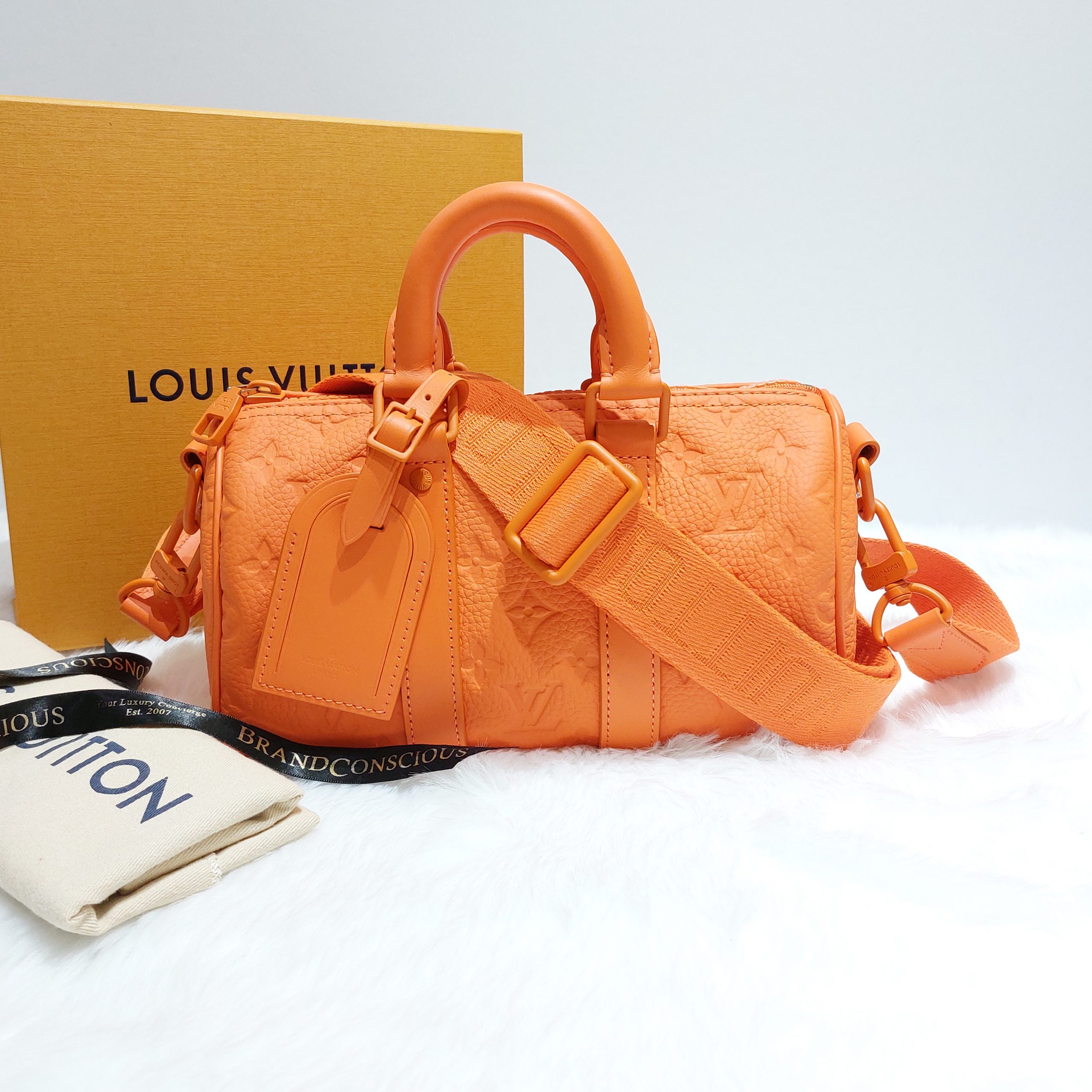 Keepall leather travel bag Louis Vuitton Orange in Leather - 30548885