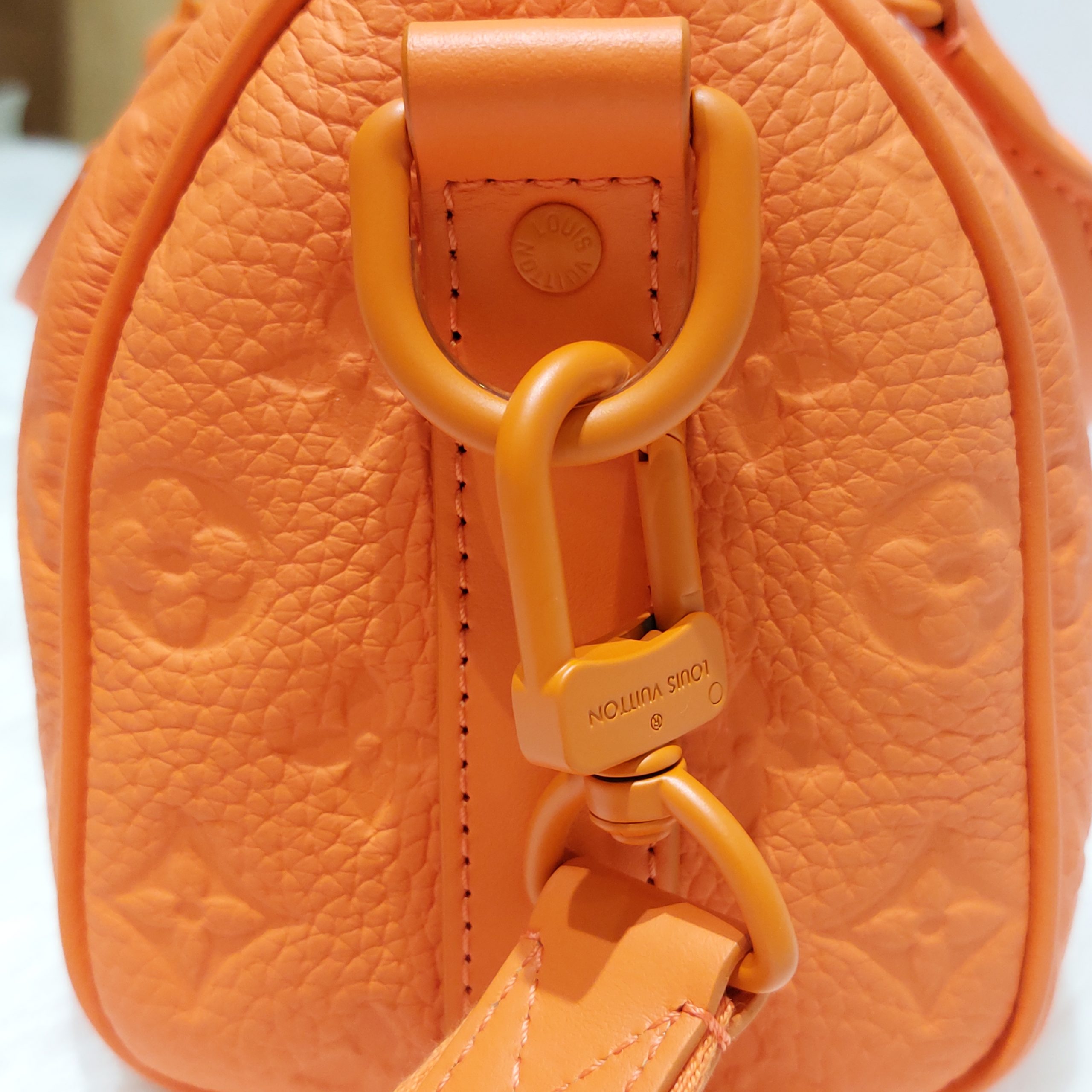 LOUIS VUITTON Monogram Taurillon Keepall Bandouliere 25 Orange