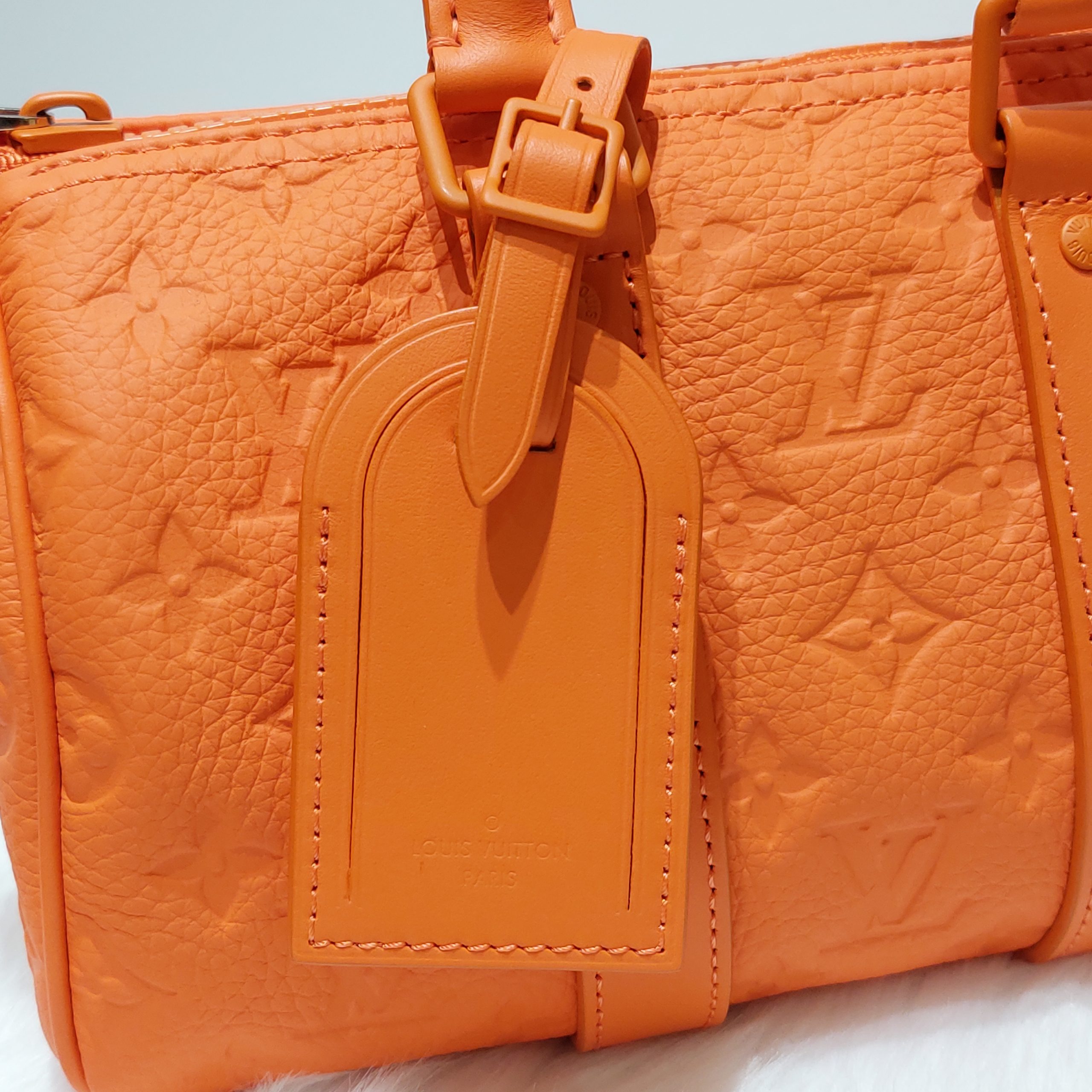 Louis Vuitton Keepall Bandouliere 25 Monogram Embossed Orange in