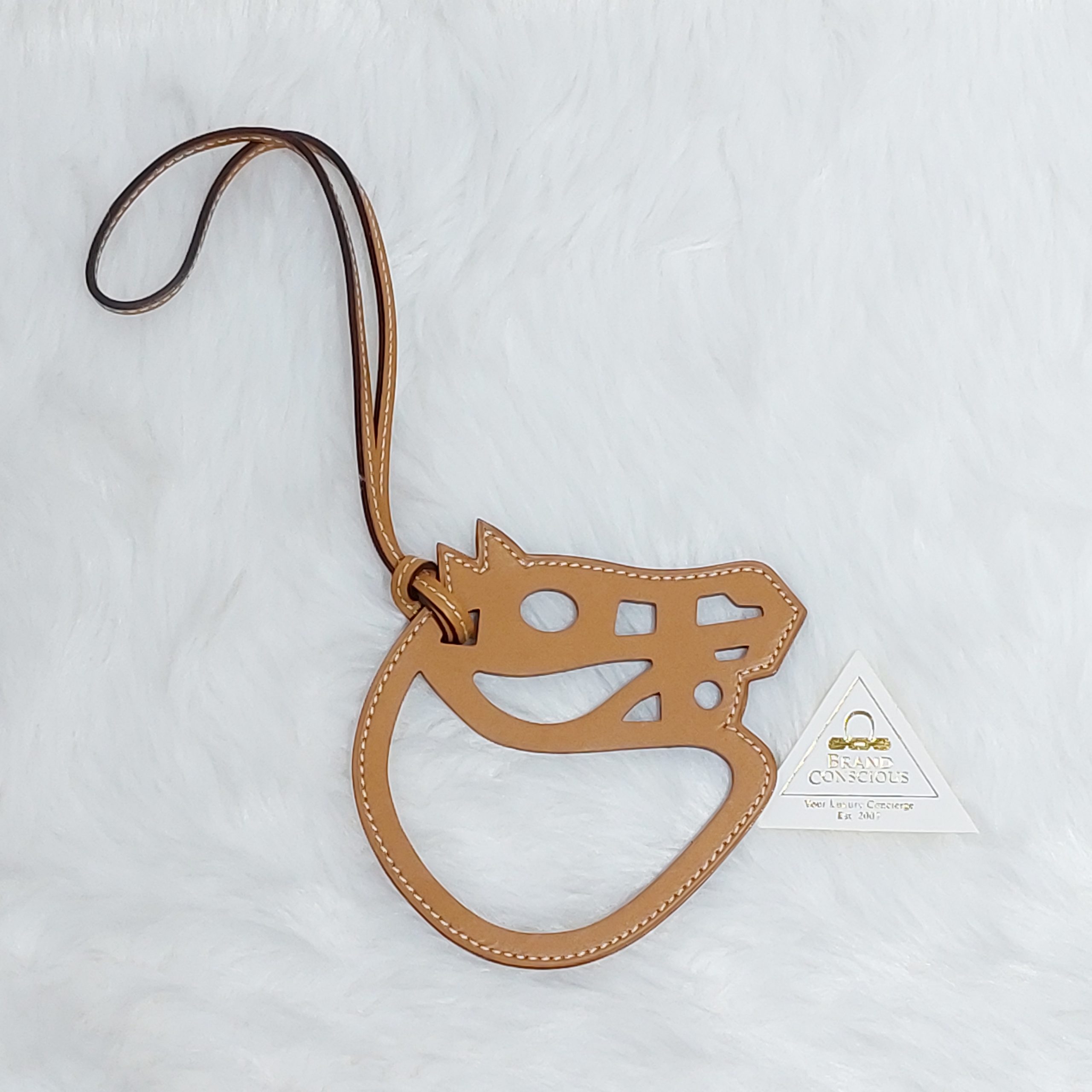 Hermes Horse Face Paddock Cheval Bag Charm Natural Sable - BrandConscious  Authentics