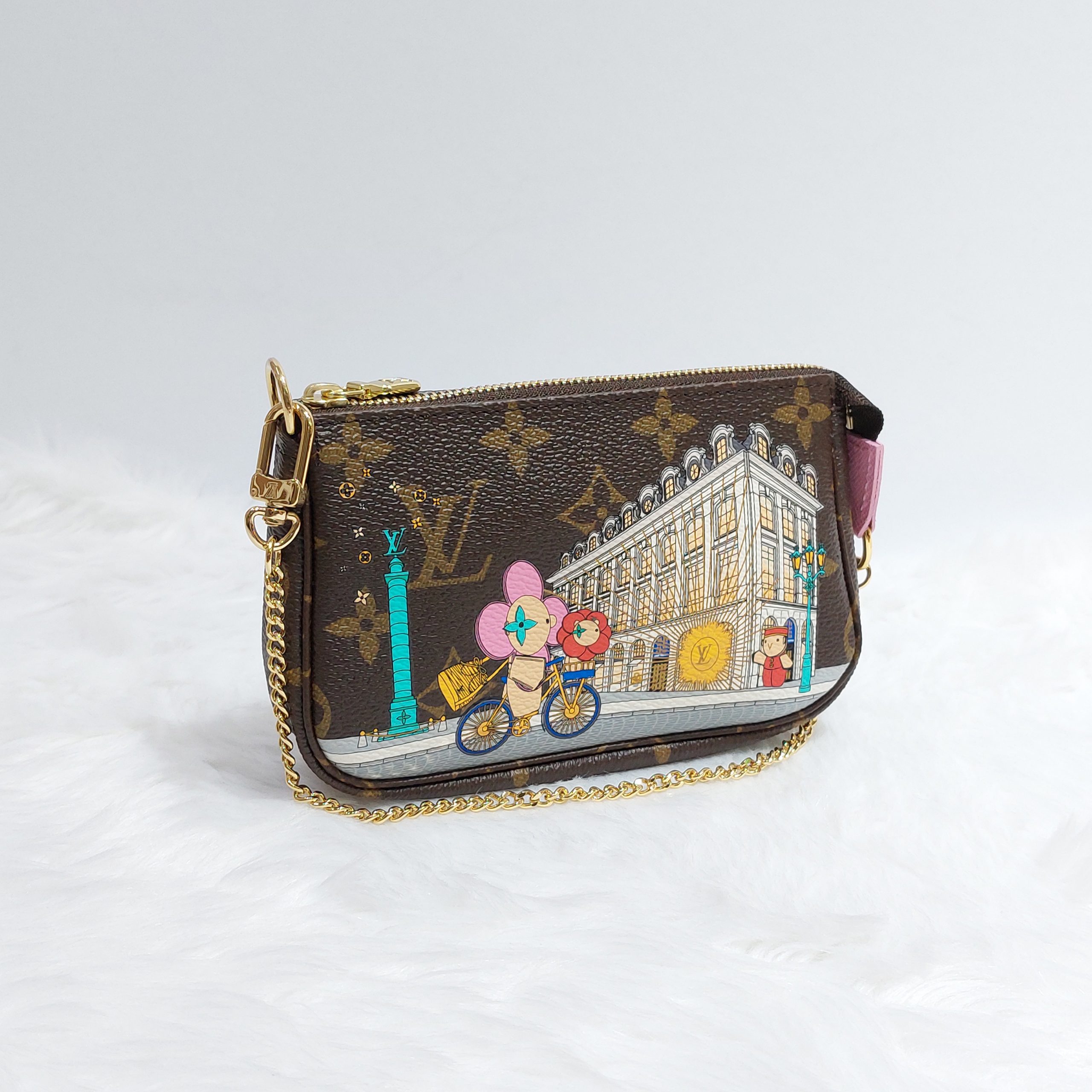 Louis Vuitton Mini Pochette Accessoires Limited Edition Vivienne at the Fun  Fair in Monogram - SOLD