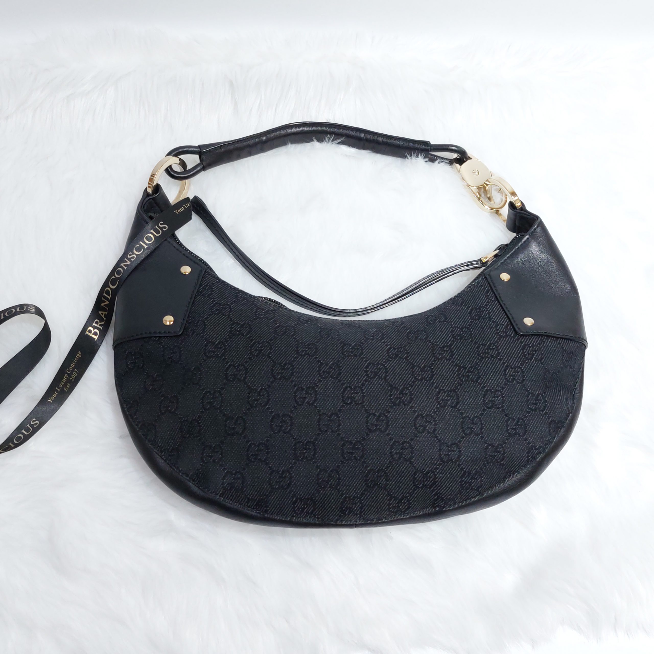 Gucci Monogram Black Canvas Half Moon Hobo Bag. Made in Italy.