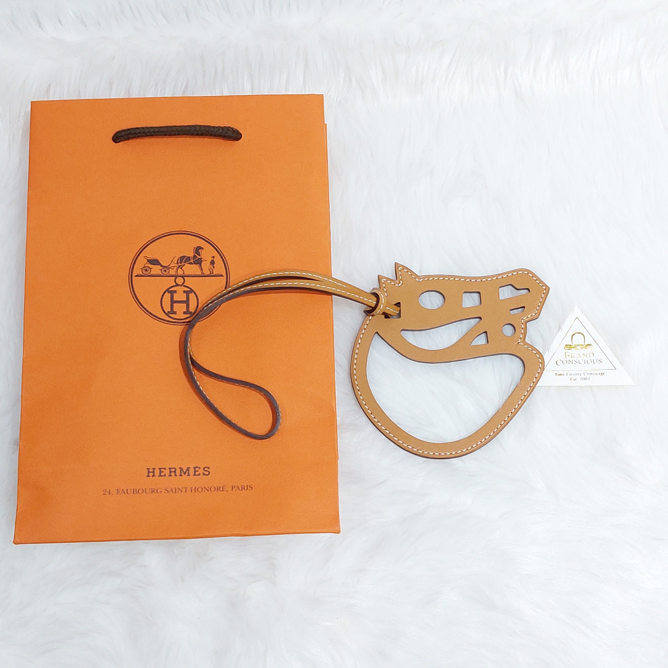 Hermes Horse Face Paddock Cheval Bag Charm Natural Sable - BrandConscious  Authentics