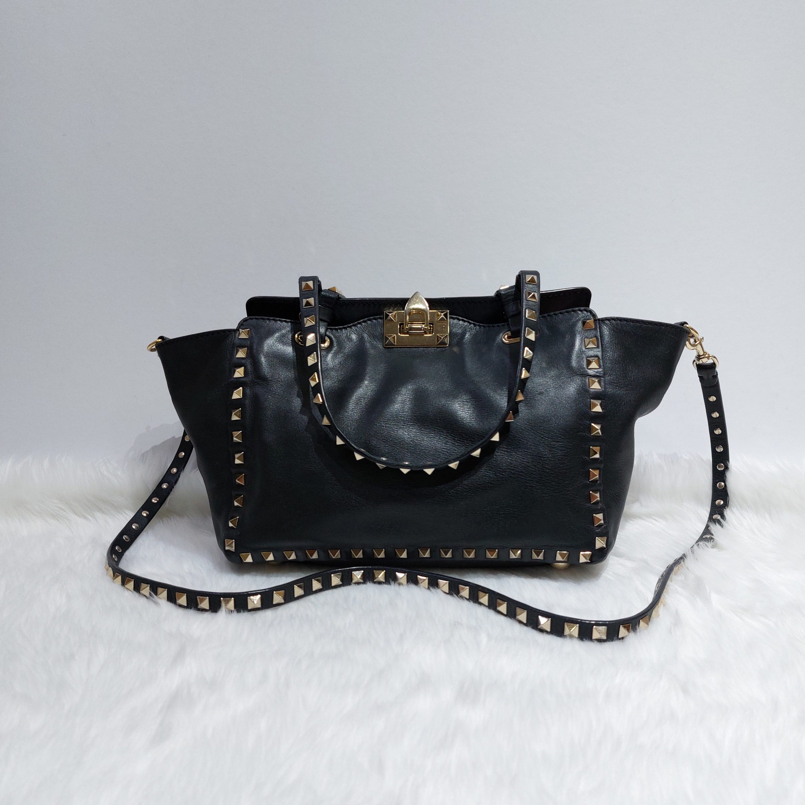 Valentino Black Patent Leather Studded Trapeze Tote, $2,545, SSENSE