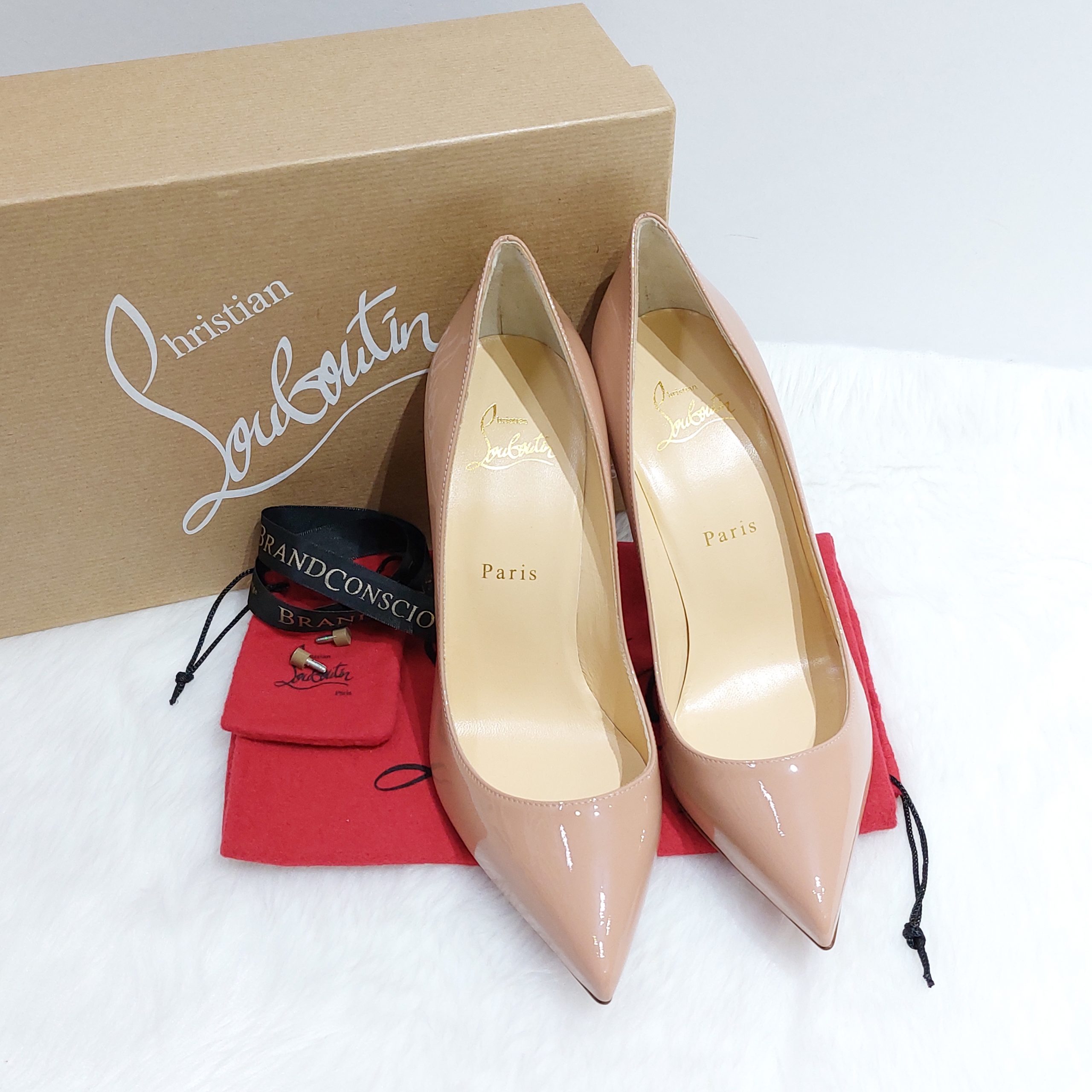 Christian Louboutin, Kate 100 patent nude pumps