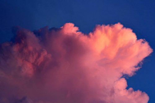 Salmon Cloud with Dark Blue Sky