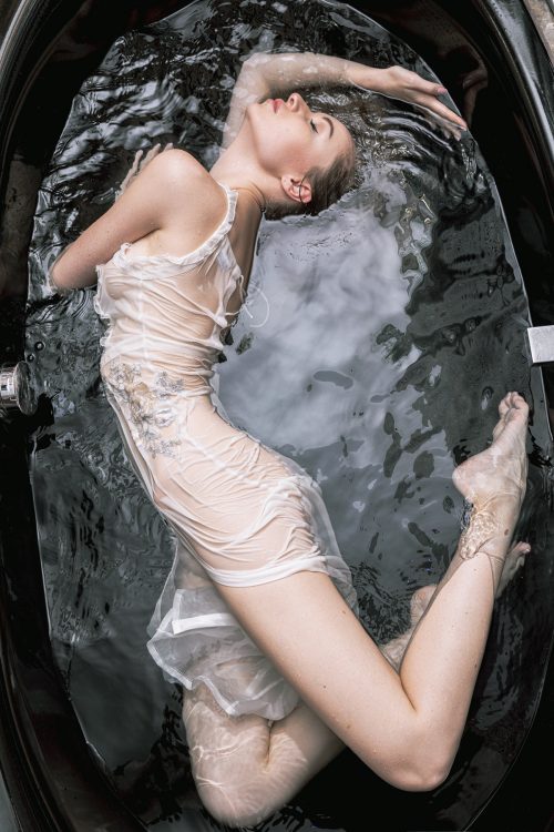 Floating ghost Soaking Wet In a Bath Tub Erotic Model Photography