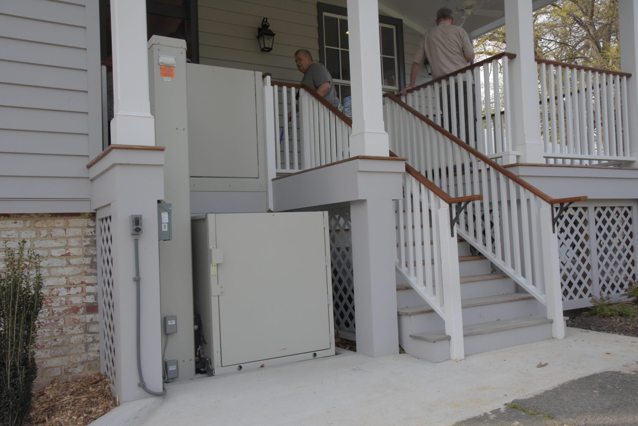 Chair lift next to porch stairs