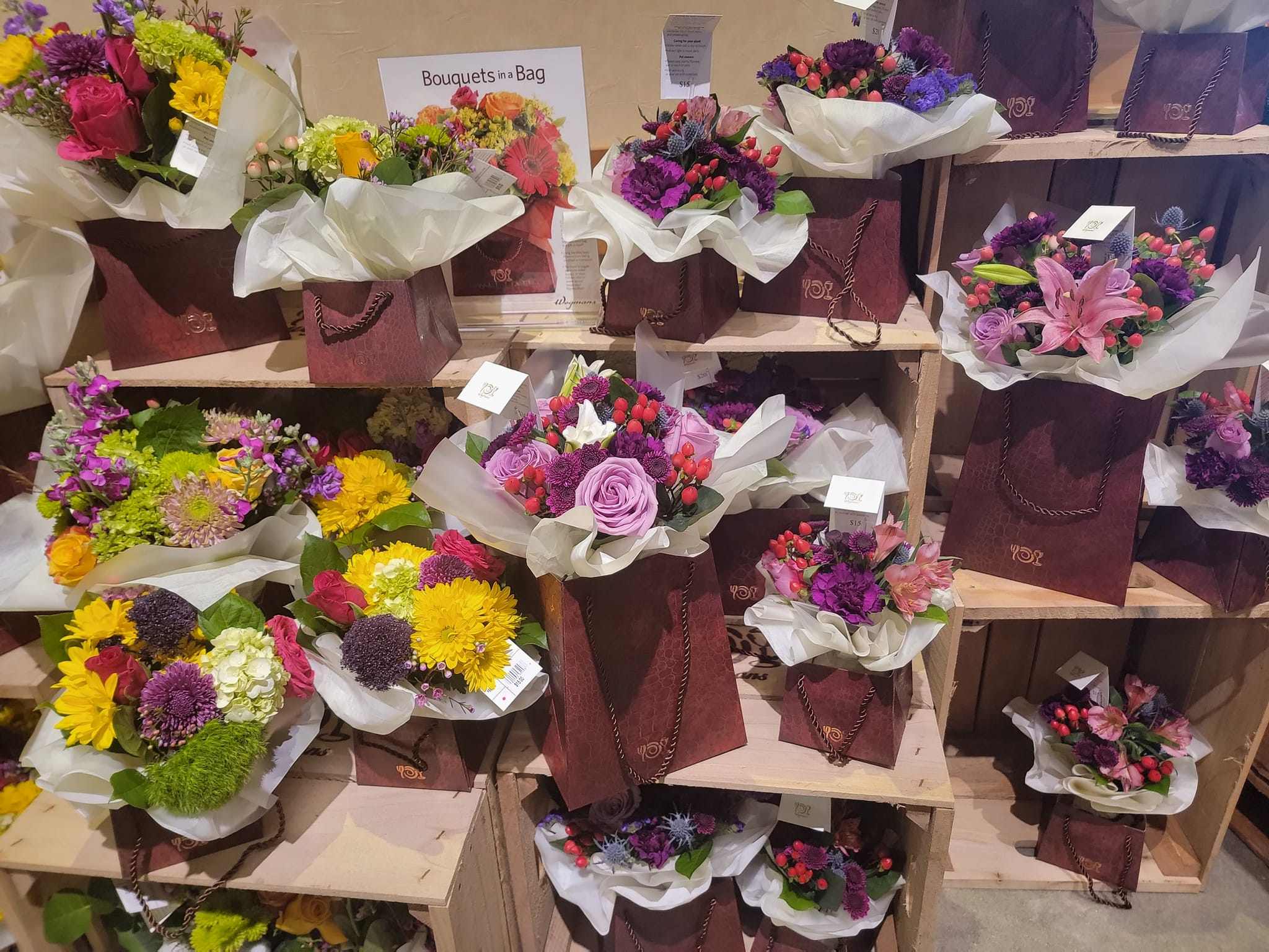 arrangements of purple, yellow, and red flowers